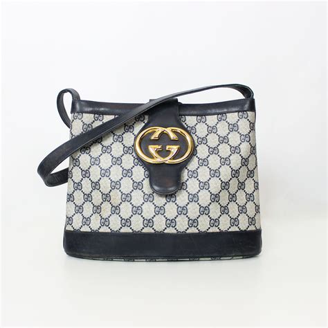 gucci bag with gucci sticker|vintage Gucci logo bag.